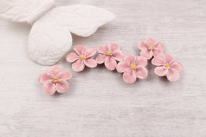 Breloques primevères en céramique fabriquées à la main en France pour création de bijoux et accessoires