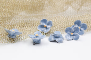 Handmade ceramic clovers for jewelry and accessories making