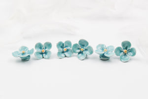 Handmade ceramic clovers for jewelry and accessories making