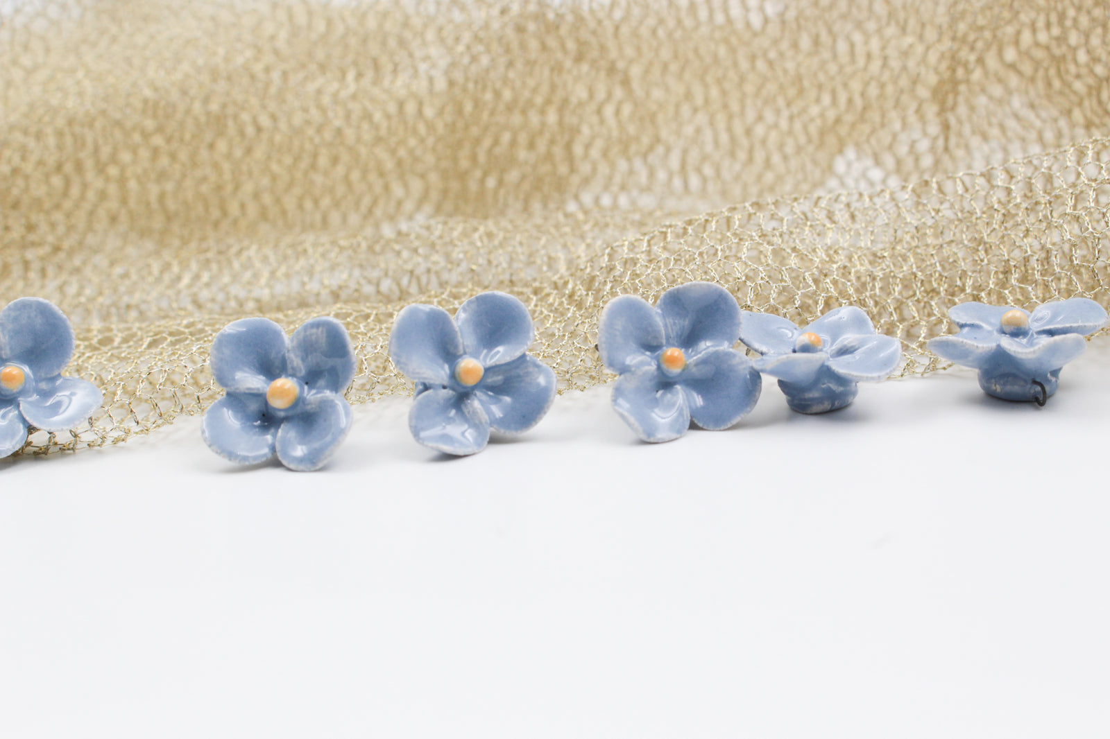 Handmade ceramic clovers for jewelry and accessories making