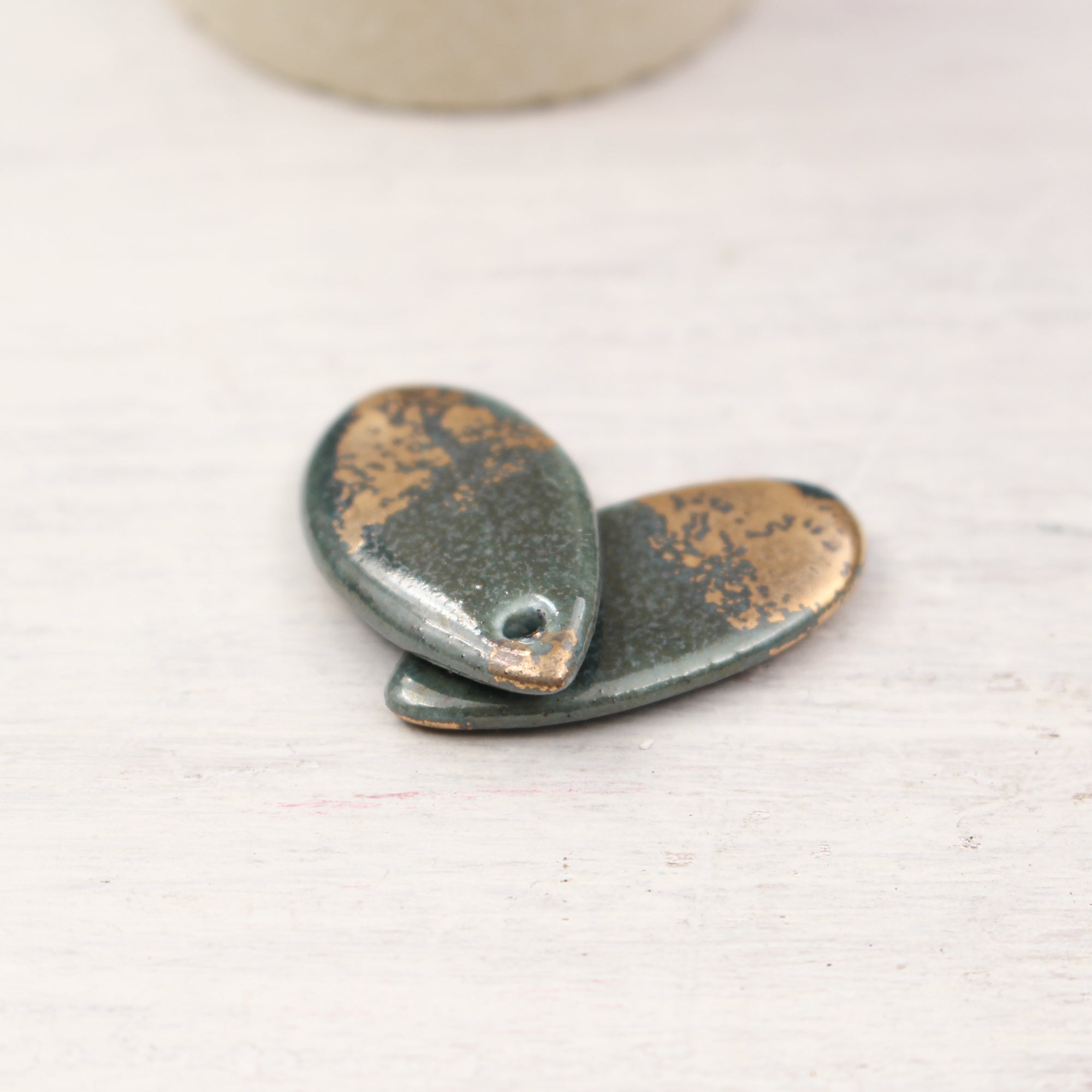 Ceramic and Gold Charms for Jewelry and accessories handmade in France by Alain Granell