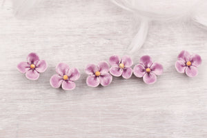 Handmade ceramic clovers for jewelry and accessories making