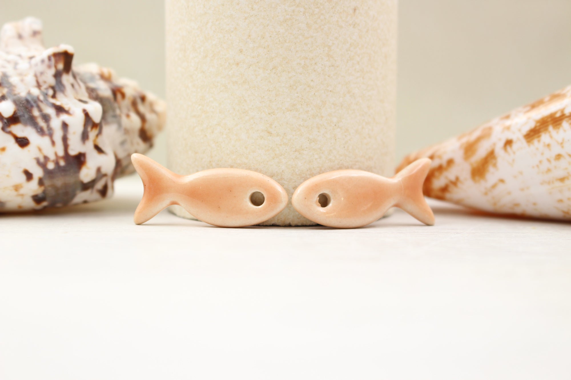 Ceramic fish charms for jewelry and accessories handmade in France by Alain Granell