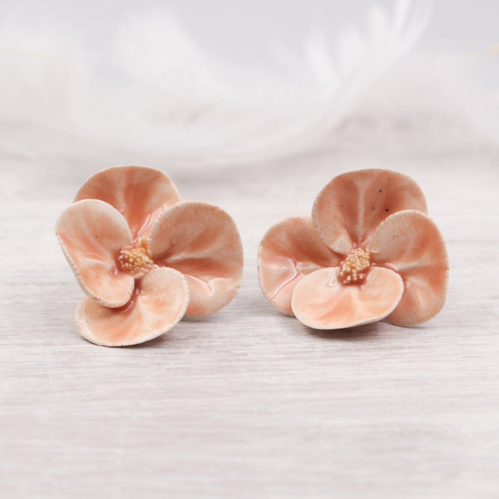 Handmade ceramic poppies for jewelry and accessories making