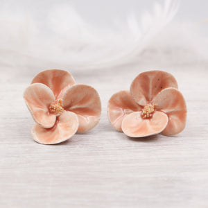 Handmade ceramic poppies for jewelry and accessories making