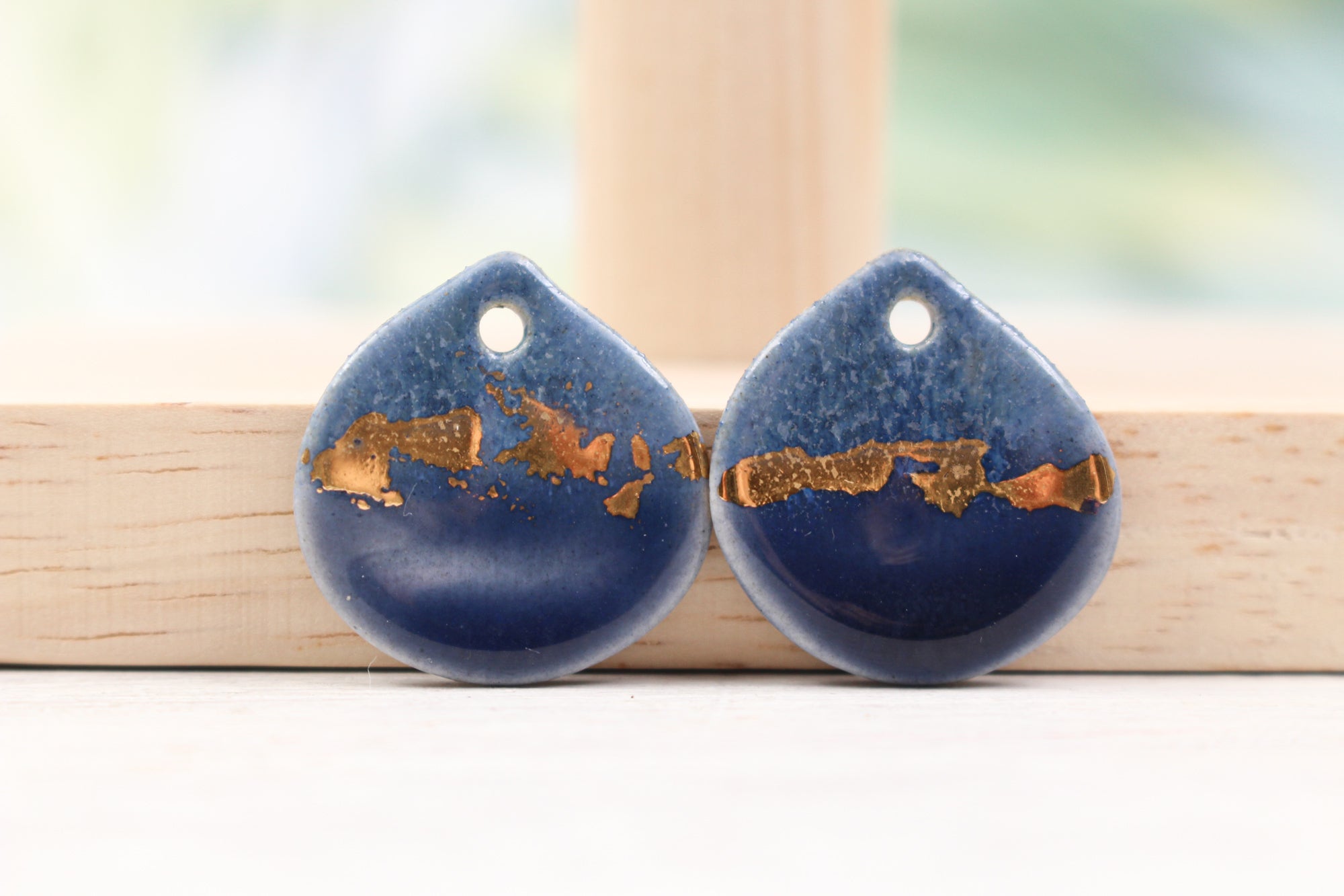 Multicolor ceramic and gold petal charms handmade in France by Alain Granell