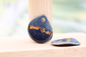 Multicolor ceramic and gold petal charms handmade in France by Alain Granell