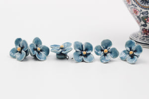 Handmade ceramic clovers for jewelry and accessories making