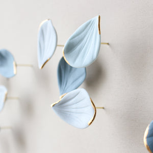Blue Autumn is a Large porcelain wall art of Blue Leaves handmade in France by Alain Granell
