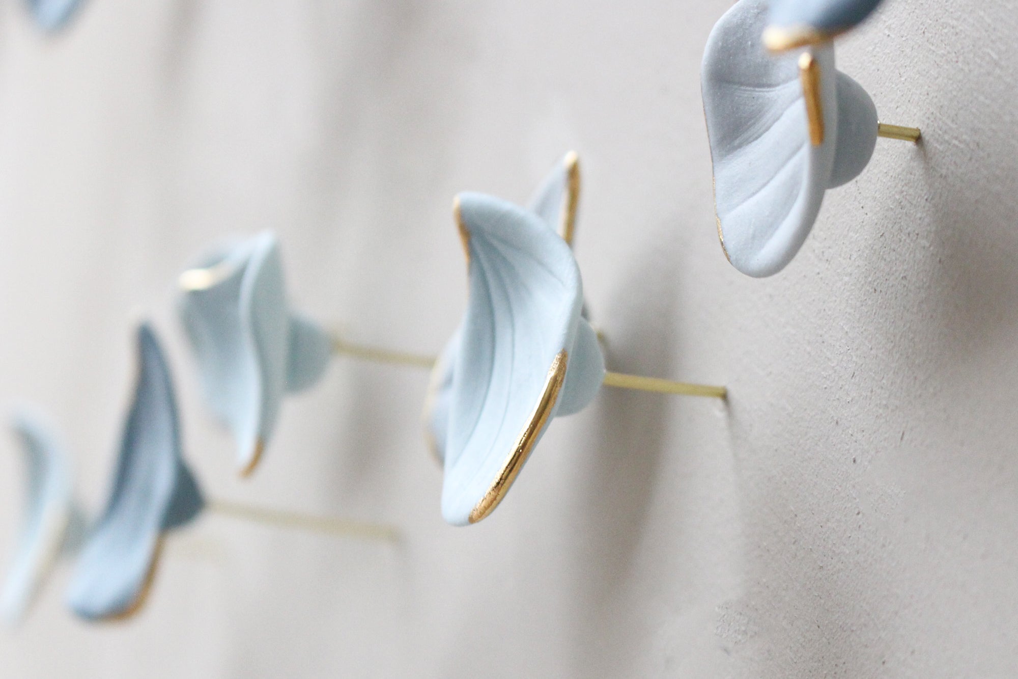 Blue Autumn is a Large porcelain wall art of Blue Leaves handmade in France by Alain Granell