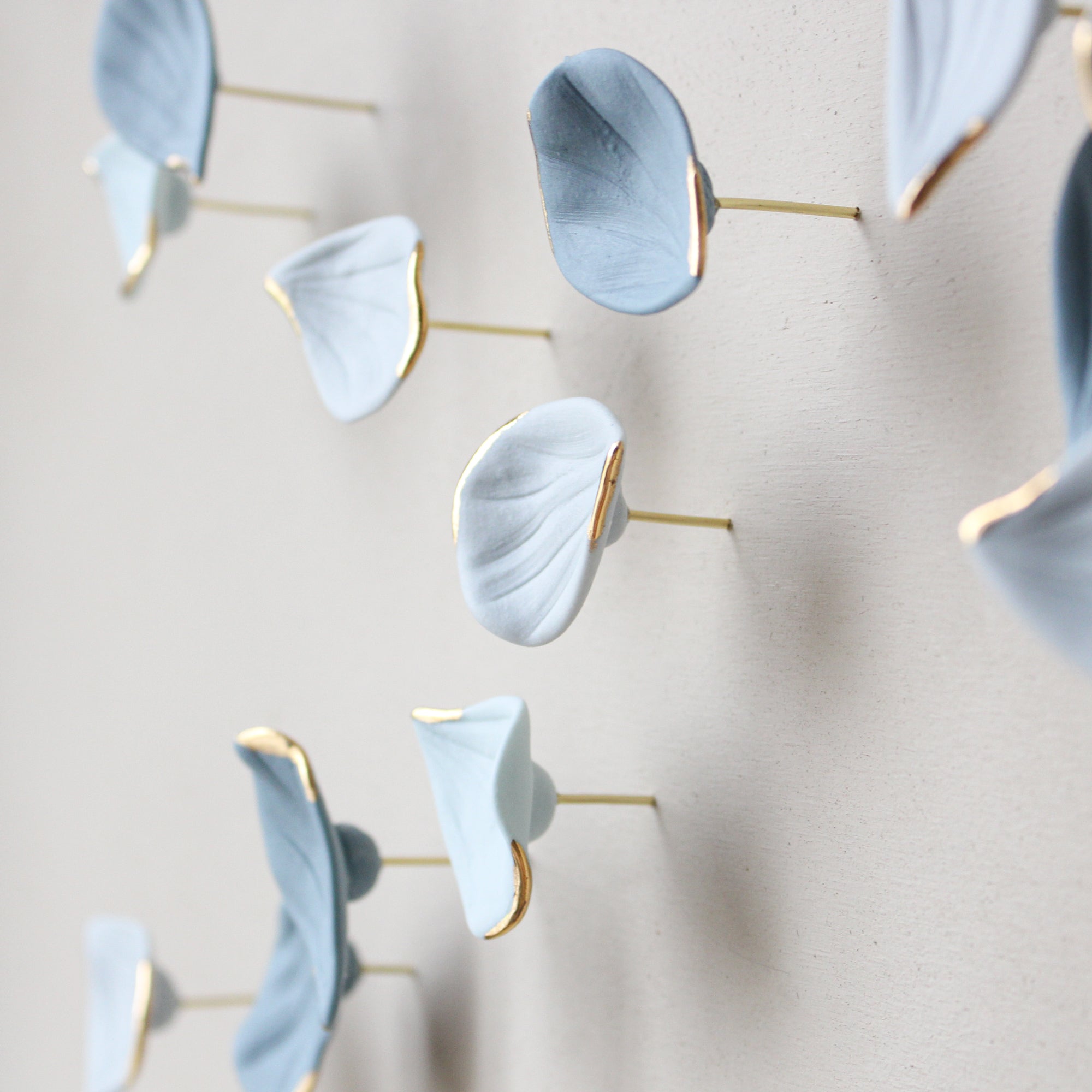 Blue Autumn is a Large porcelain wall art of Blue Leaves handmade in France by Alain Granell
