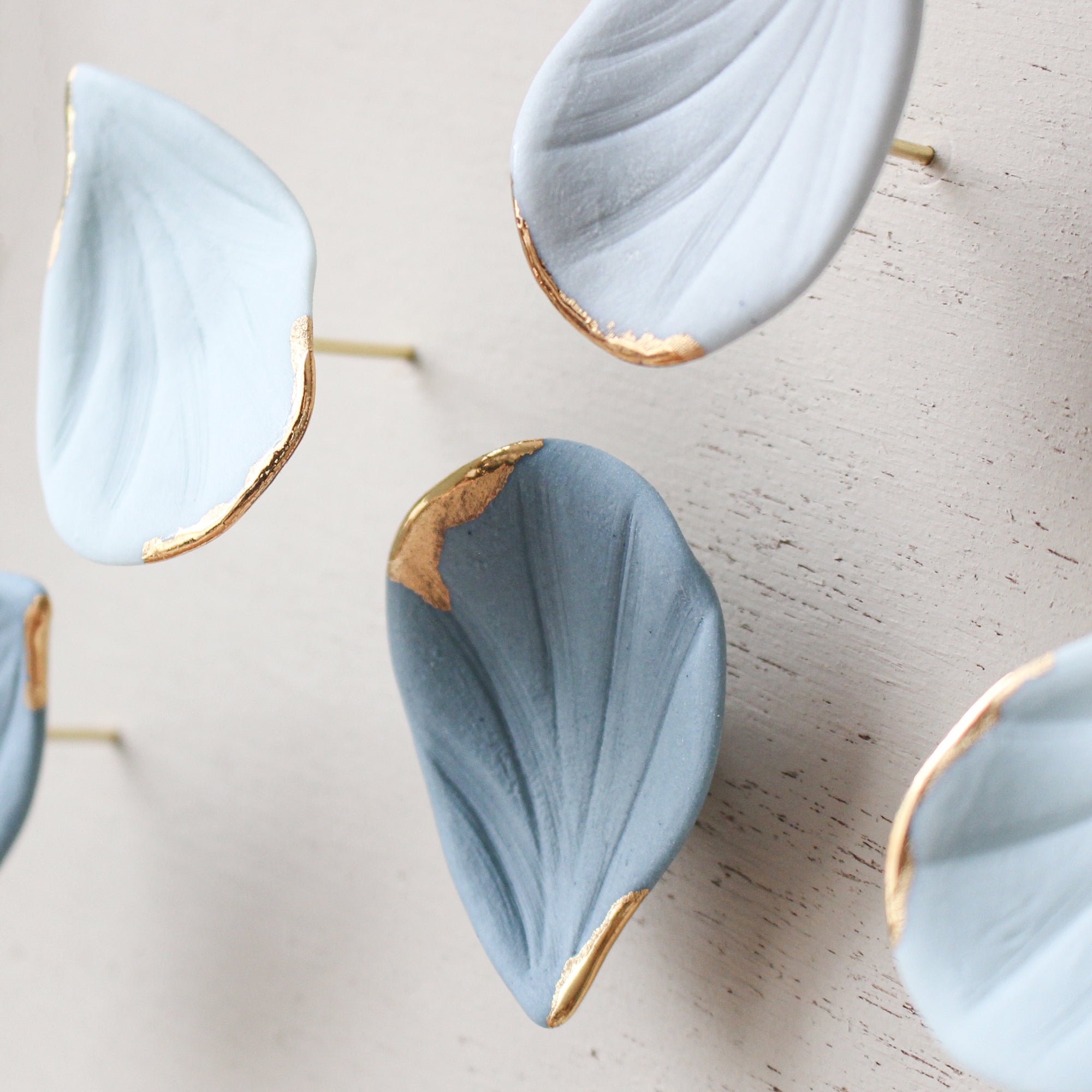 Blue Autumn is a Large porcelain wall art of Blue Leaves handmade in France by Alain Granell