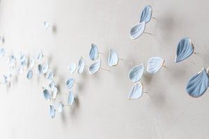 Blue Autumn is a Large porcelain wall art of Blue Leaves handmade in France by Alain Granell