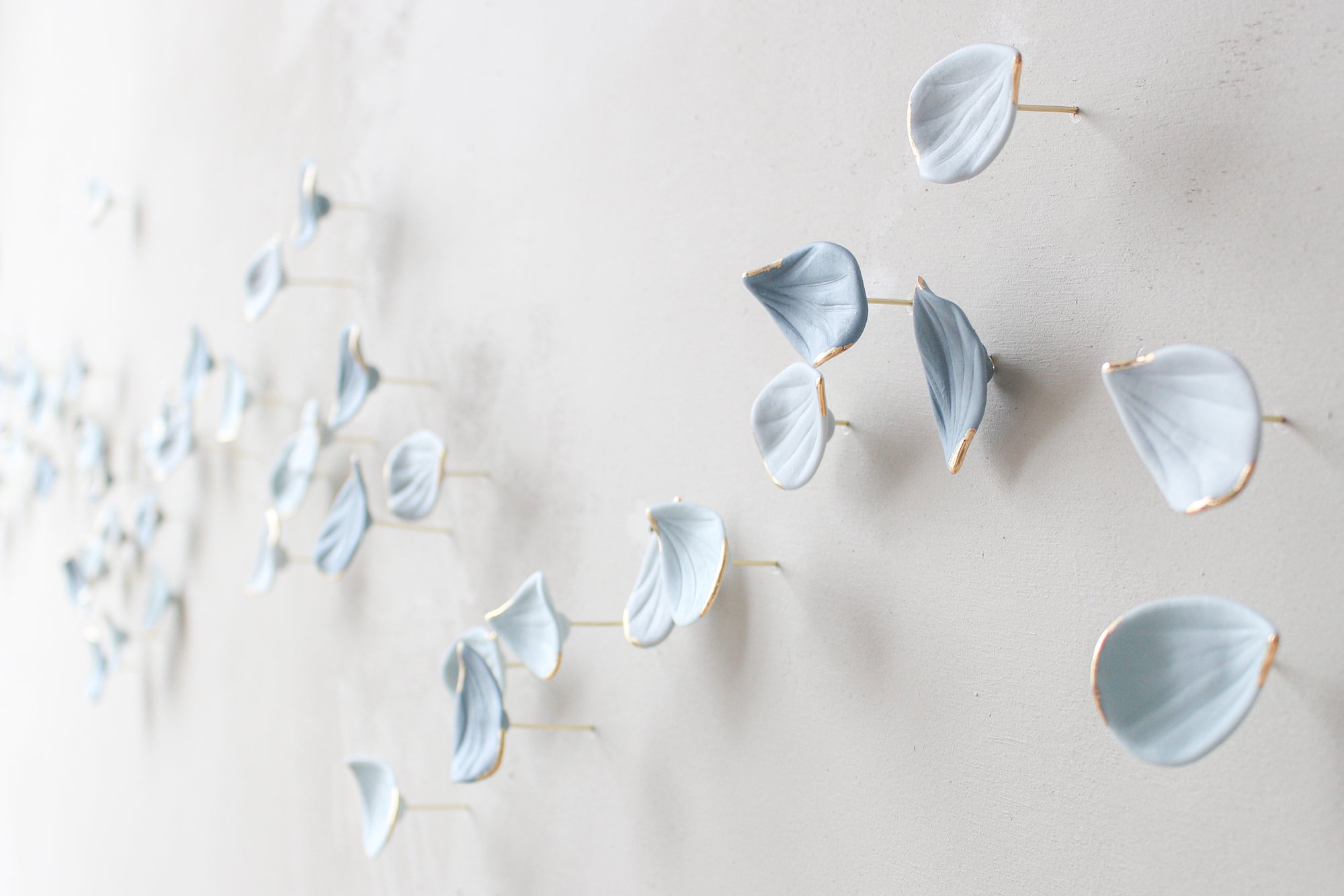 Blue Autumn is a Large porcelain wall art of Blue Leaves handmade in France by Alain Granell