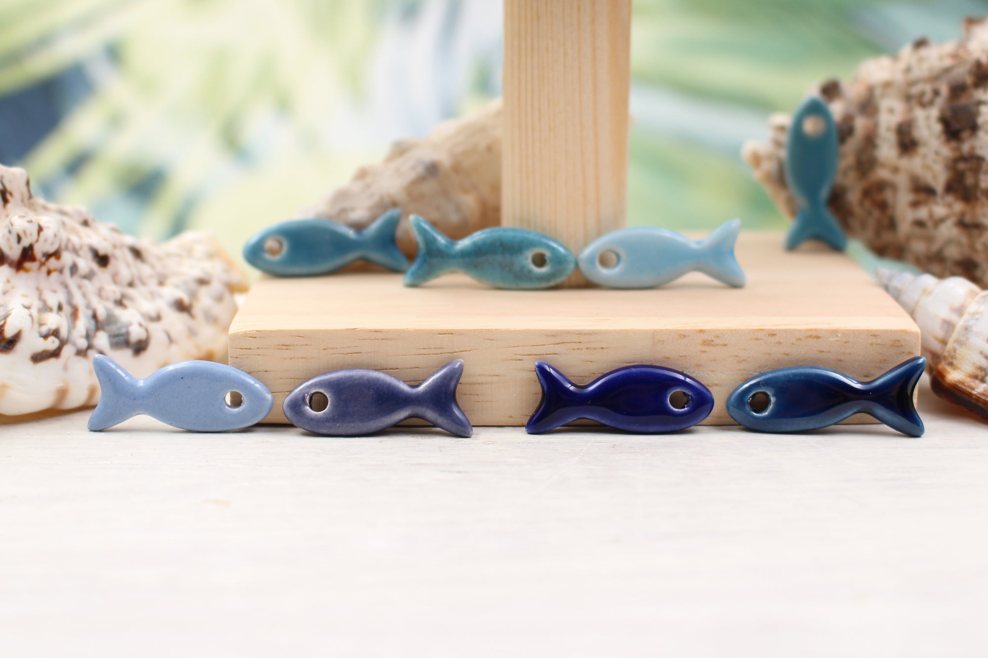 Ceramic fish charms for jewelry and accessories handmade in France by Alain Granell