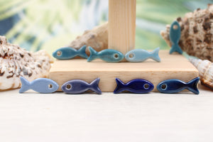Ceramic fish charms for jewelry and accessories handmade in France by Alain Granell