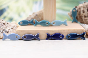 Ceramic fish charms for jewelry and accessories handmade in France by Alain Granell