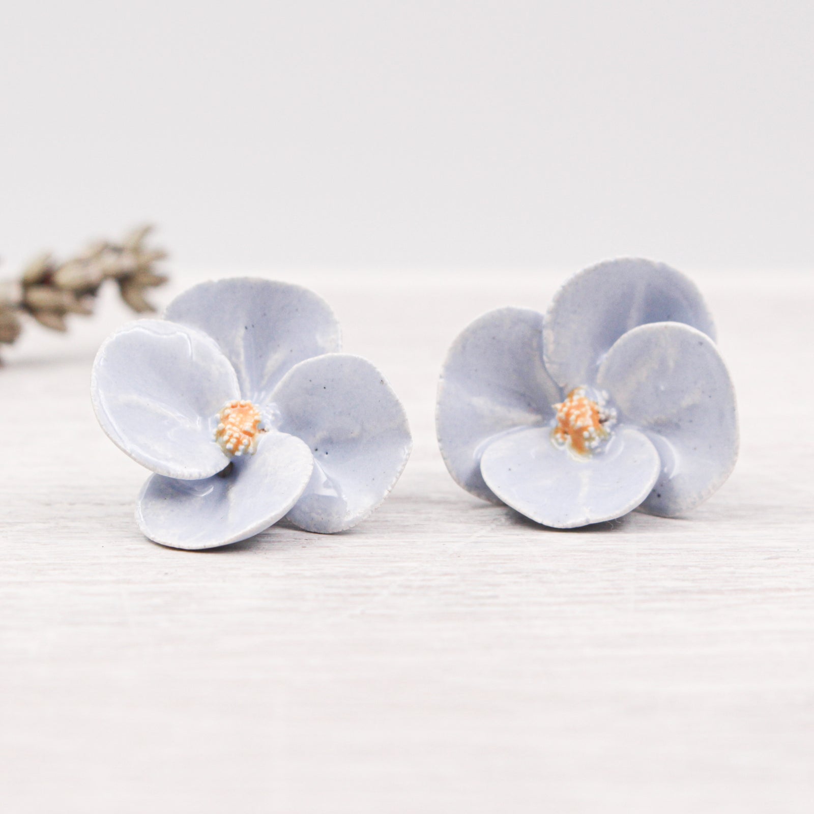 Handmade ceramic poppies for jewelry and accessories making