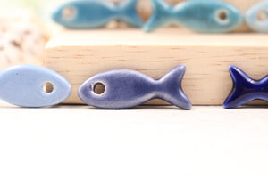 Ceramic fish charms for jewelry and accessories handmade in France by Alain Granell