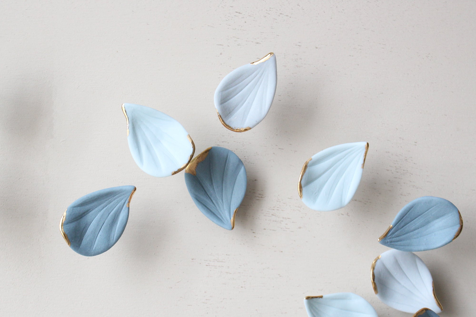 Blue Autumn is a Large porcelain wall art of Blue Leaves handmade in France by Alain Granell