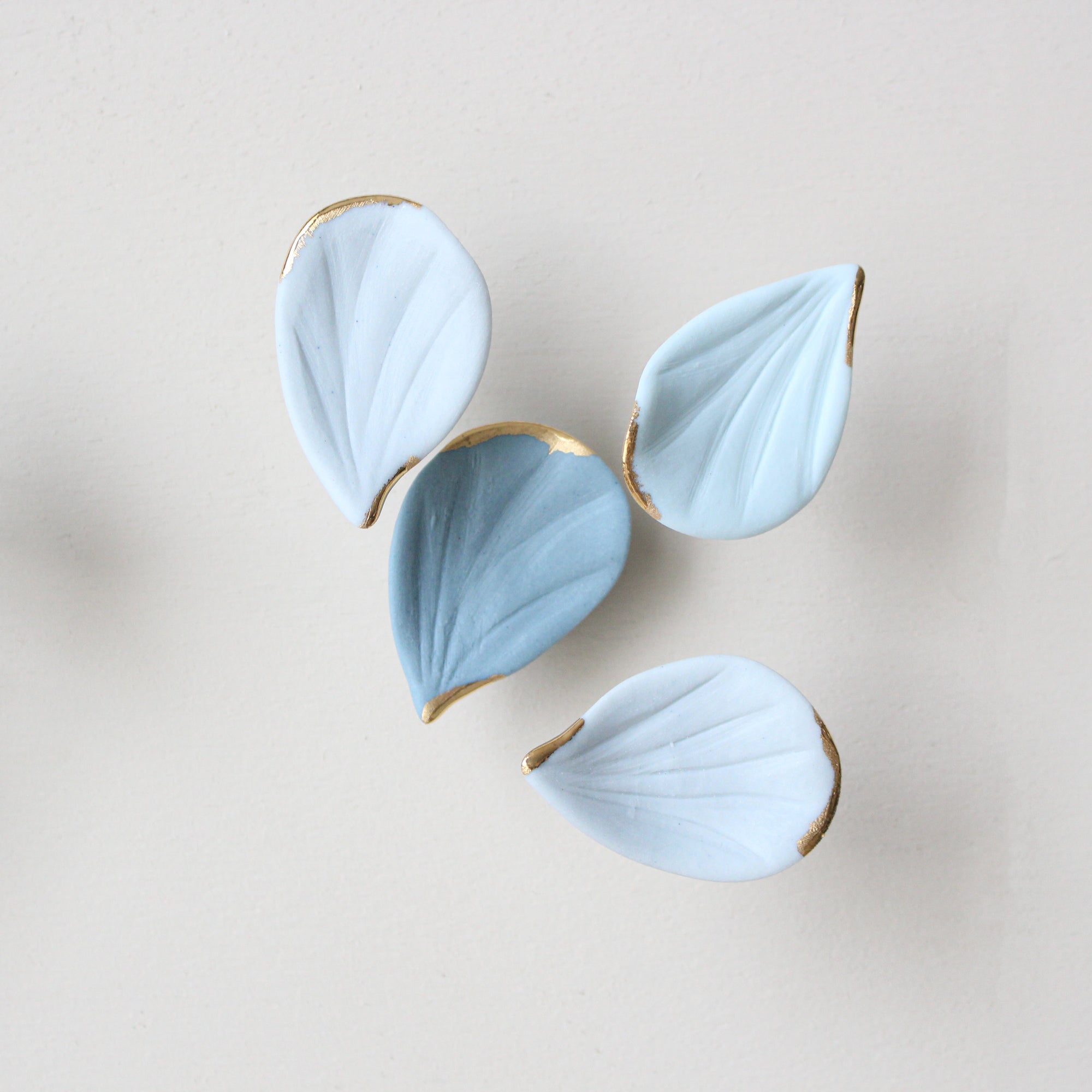 Blue Autumn is a Large porcelain wall art of Blue Leaves handmade in France by Alain Granell