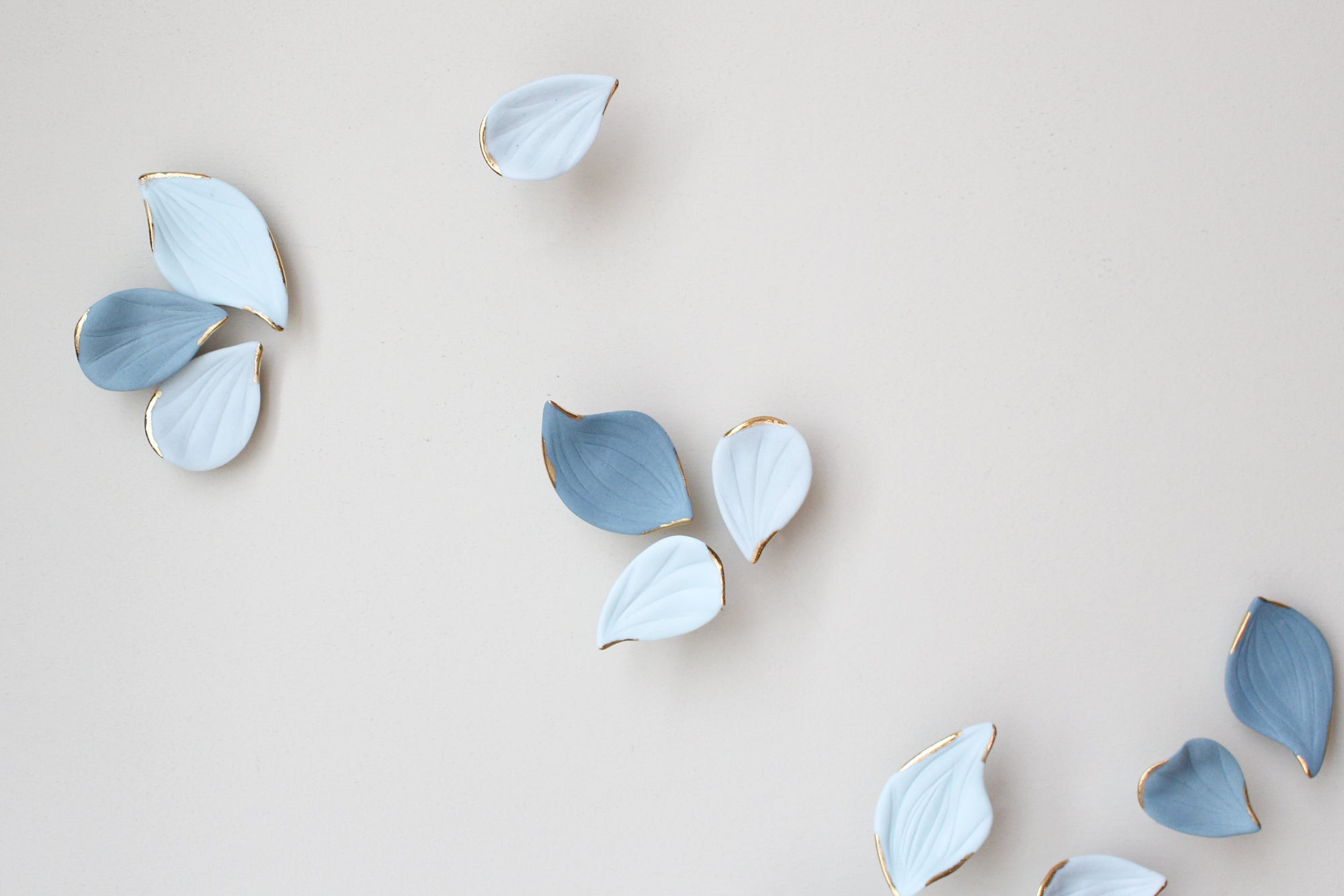 Blue Autumn is a Large porcelain wall art of Blue Leaves handmade in France by Alain Granell