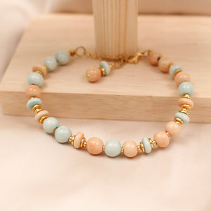 Bracelet céladon et abricot en céramique