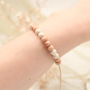 Bracelet cordon perles céramiques beige ocre