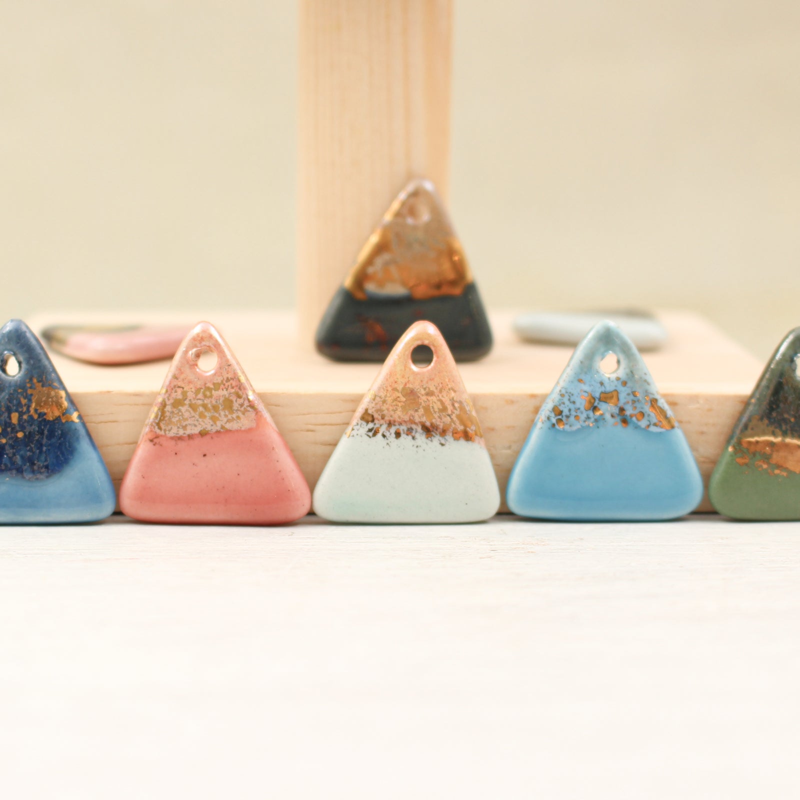 Multicolor ceramic and gold triangle charms handmade in France by Alain Granell