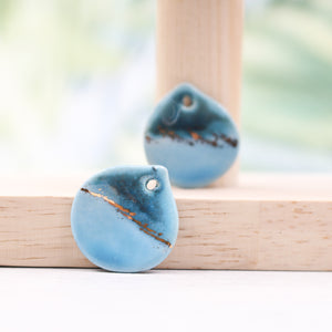 Multicolor ceramic and gold petal charms handmade in France by Alain Granell