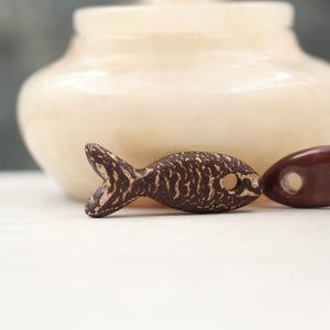 Ceramic fish charms for jewelry and accessories handmade in France by Alain Granell
