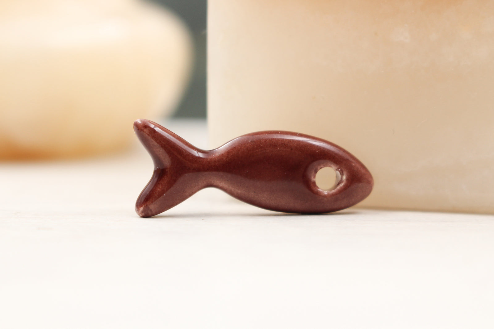 Ceramic fish charms for jewelry and accessories handmade in France by Alain Granell