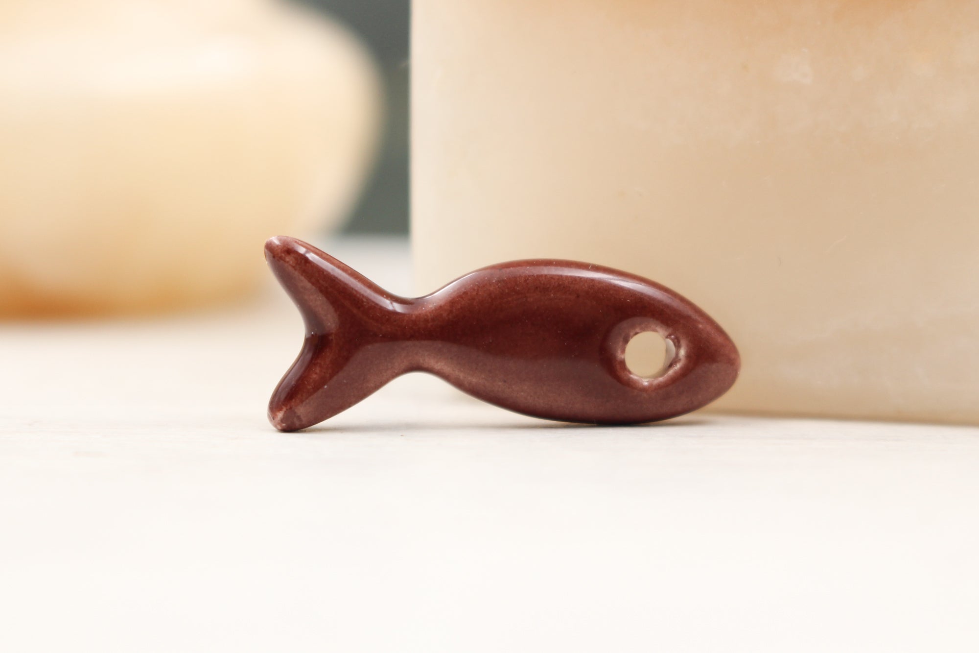 Ceramic fish charms for jewelry and accessories handmade in France by Alain Granell