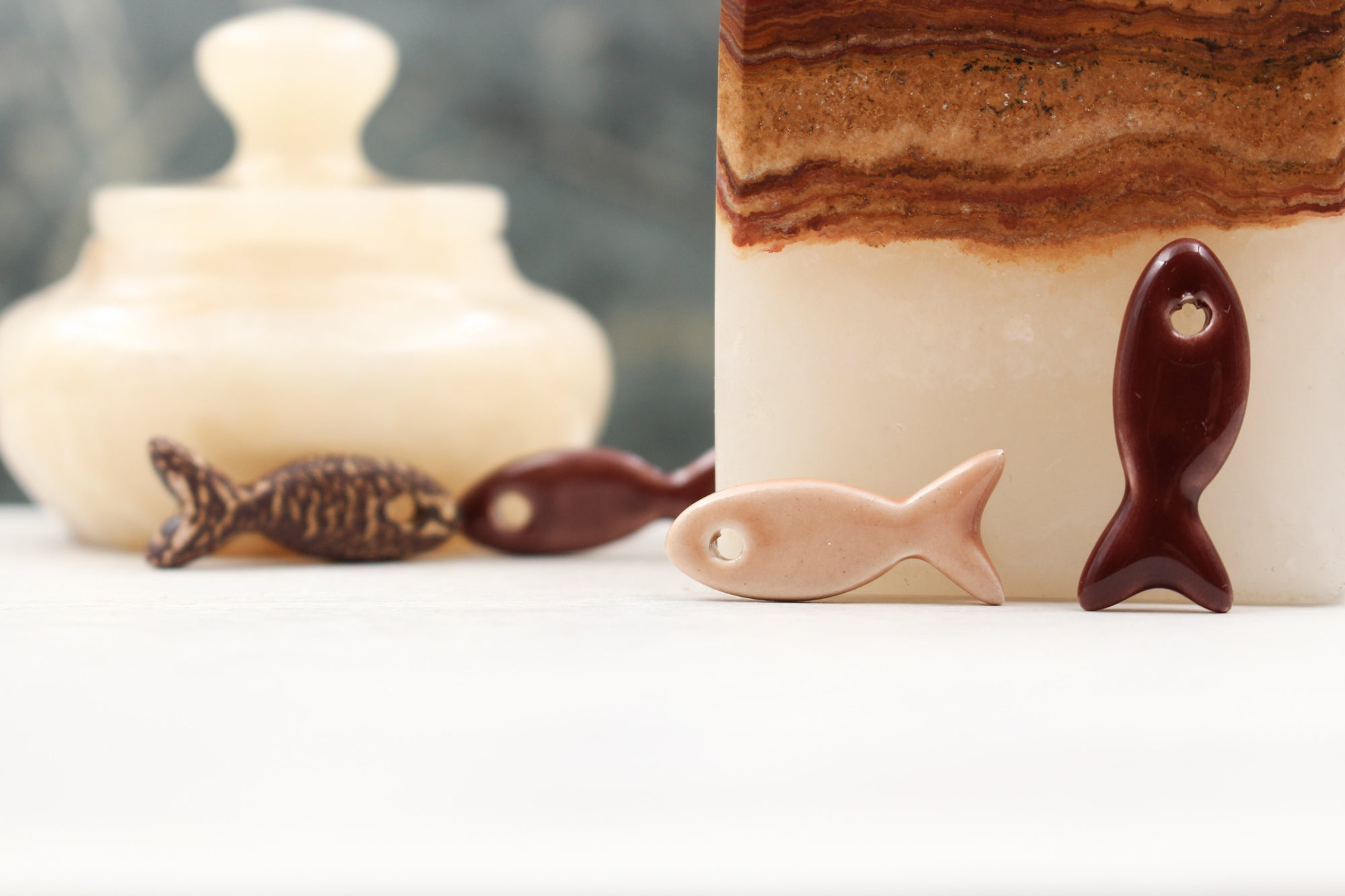 Ceramic fish charms for jewelry and accessories handmade in France by Alain Granell
