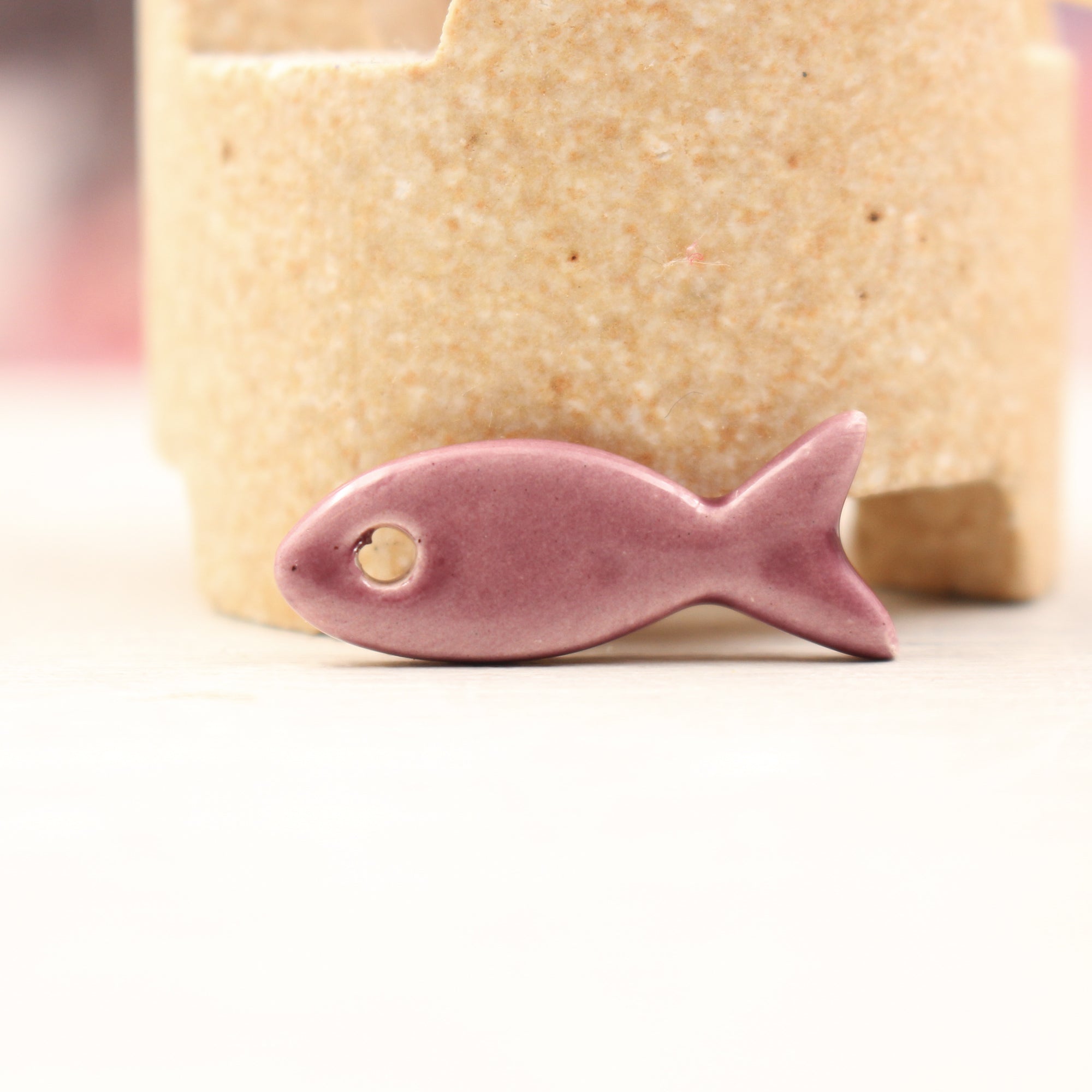 Ceramic fish charms for jewelry and accessories handmade in France by Alain Granell