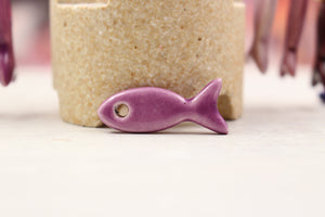 Ceramic fish charms for jewelry and accessories handmade in France by Alain Granell