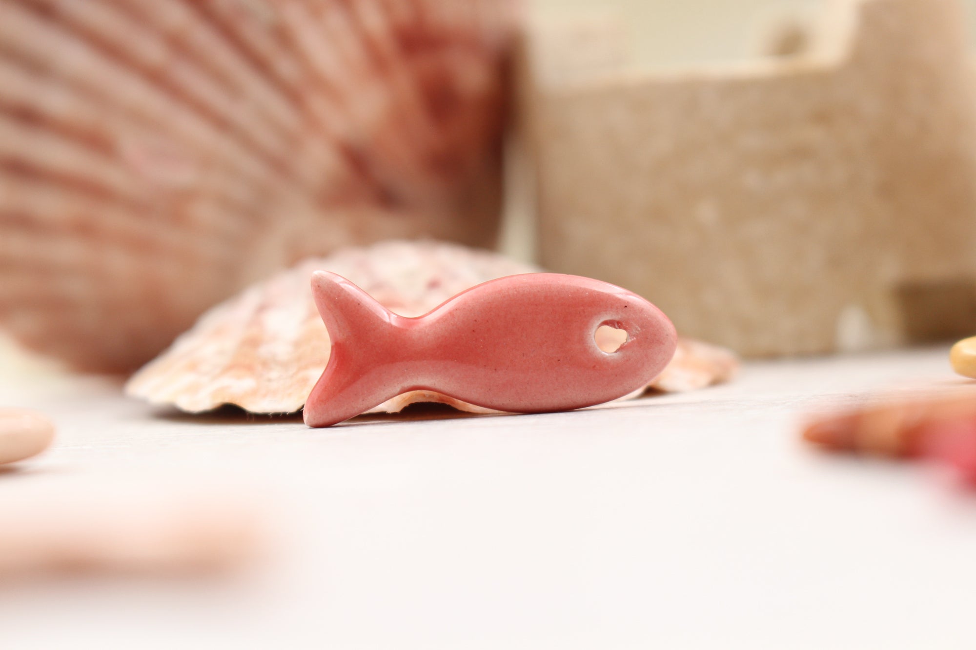 Ceramic fish charms for jewelry and accessories handmade in France by Alain Granell