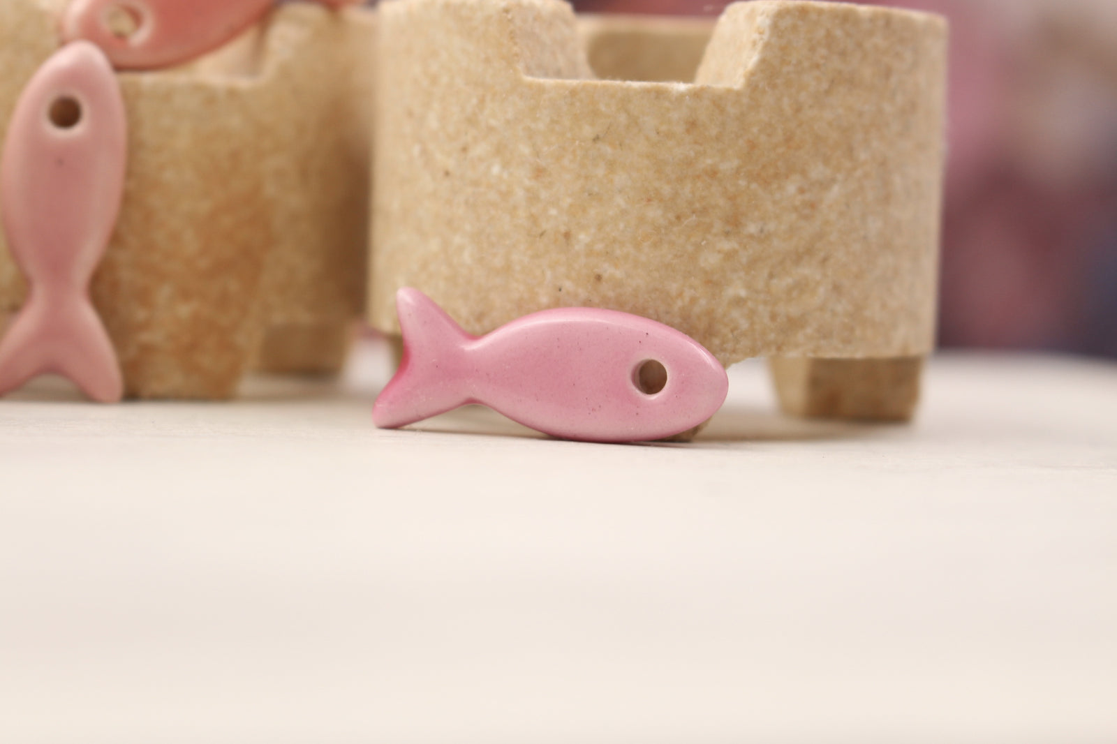 Ceramic fish charms for jewelry and accessories handmade in France by Alain Granell