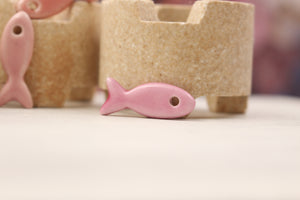 Ceramic fish charms for jewelry and accessories handmade in France by Alain Granell