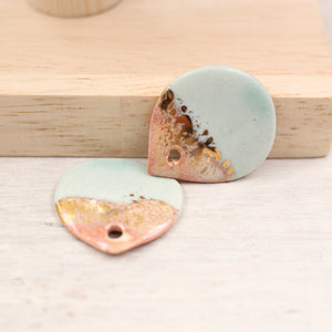 Multicolor ceramic and gold petal charms handmade in France by Alain Granell