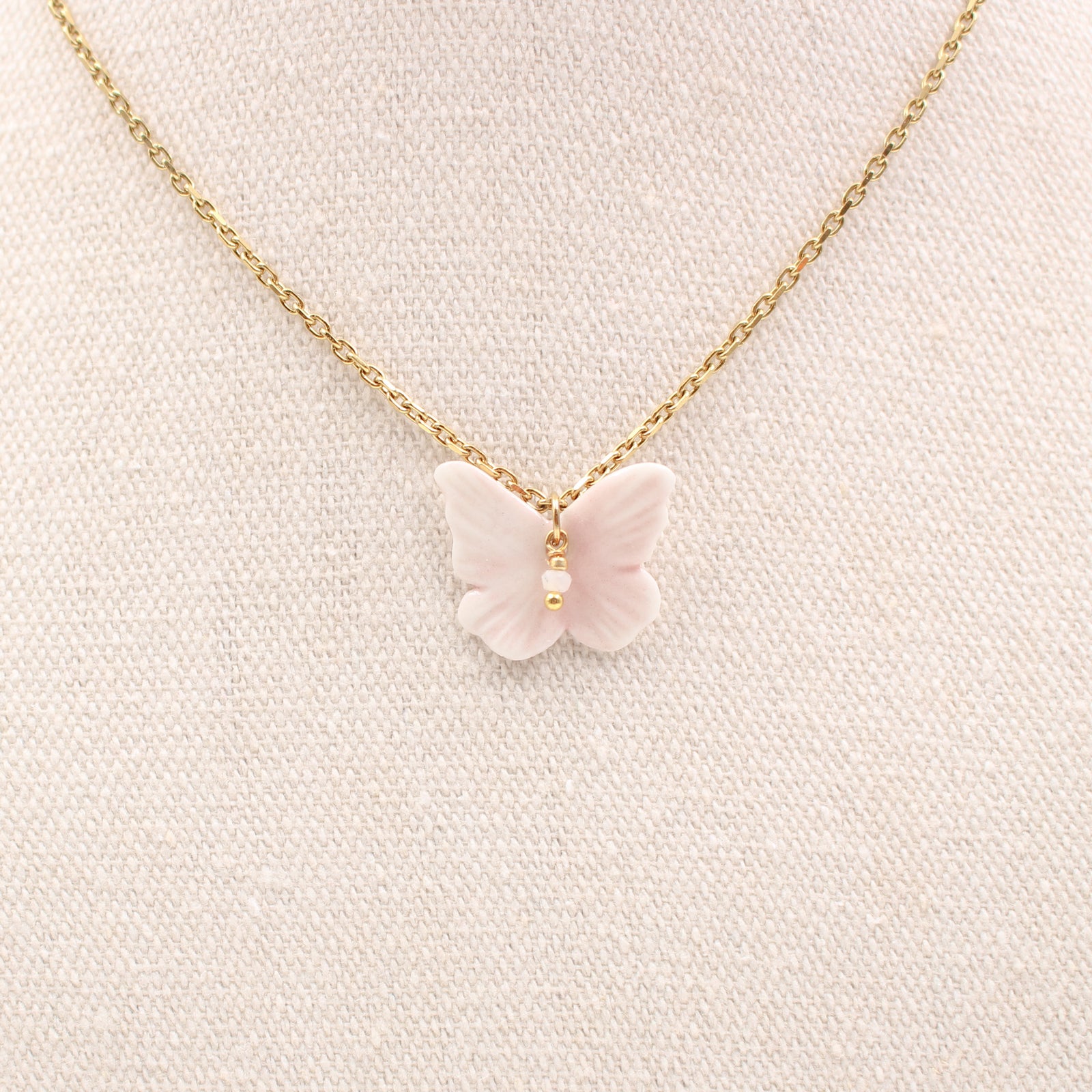 Collier acier inoxydable et papillon rose en porcelaine