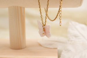 Collier acier inoxydable et papillon rose en porcelaine