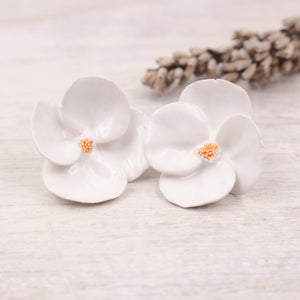 Handmade ceramic poppies for jewelry and accessories making