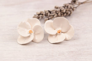 Handmade ceramic poppies for jewelry and accessories making