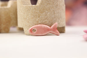 Ceramic fish charms for jewelry and accessories handmade in France by Alain Granell