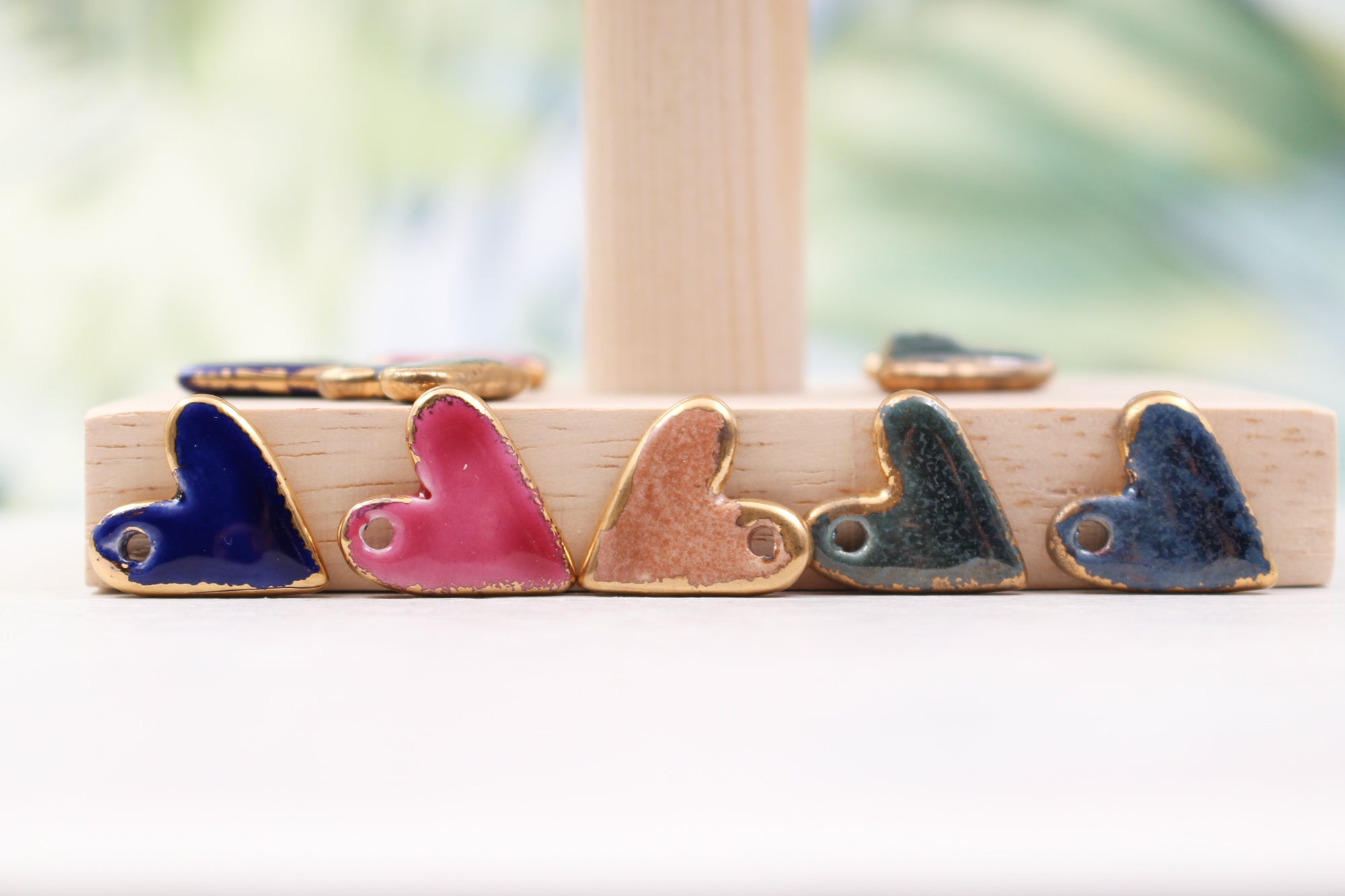 Ceramic heart charms for jewelry and accessories handmade in France by Alain Granell