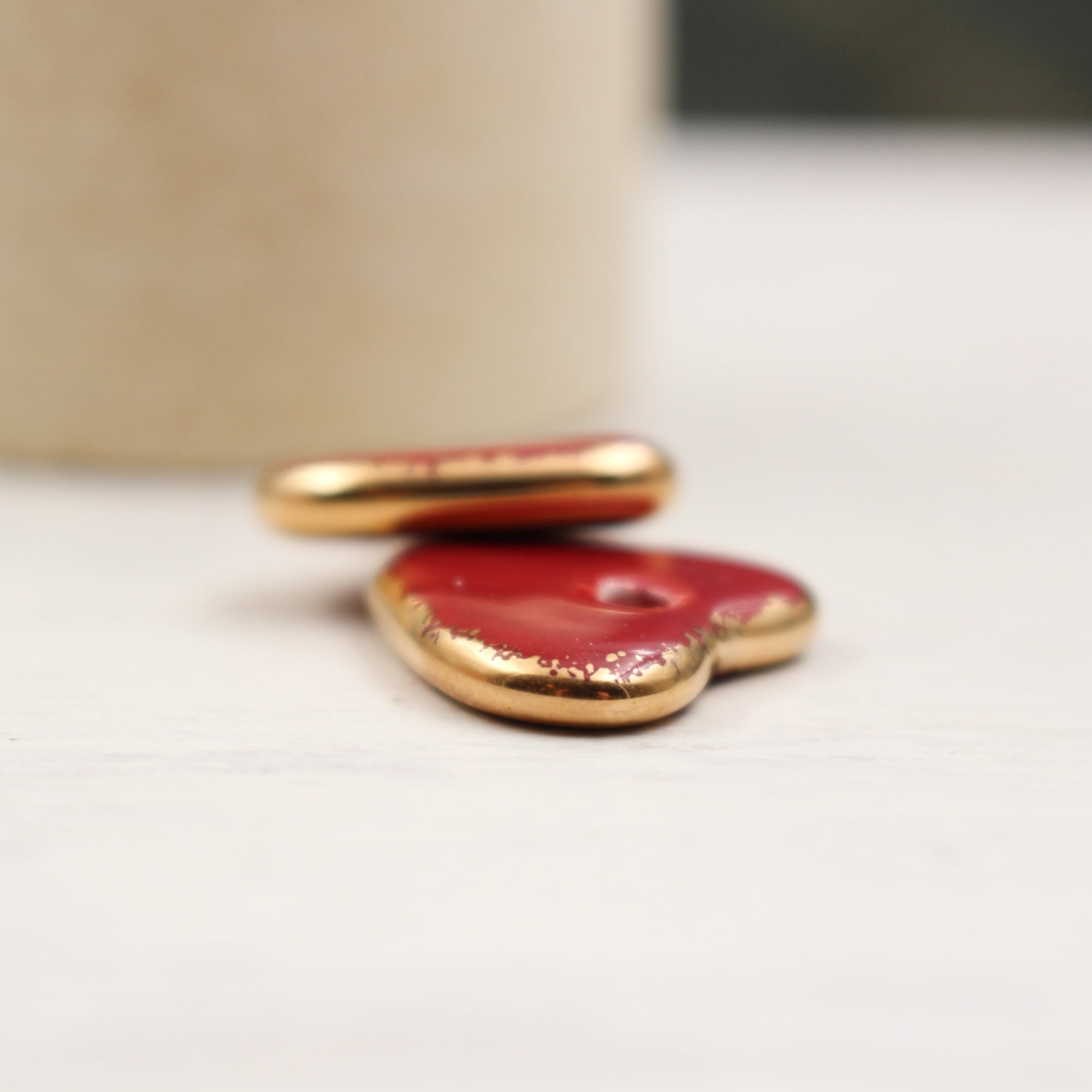 Ceramic heart charms for jewelry and accessories handmade in France by Alain Granell