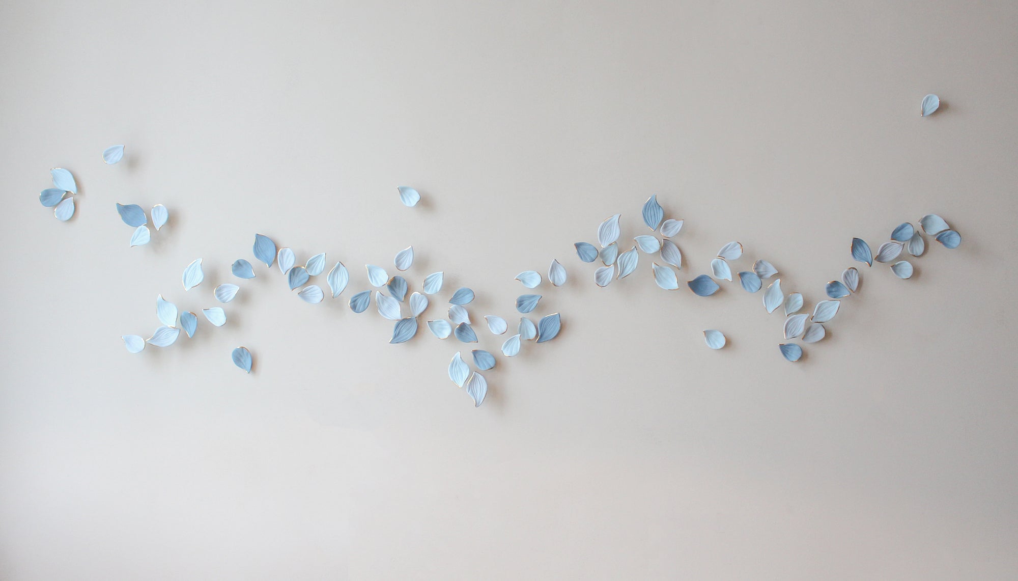 Blue Autumn is a Large porcelain wall art of Blue Leaves handmade in France by Alain Granell