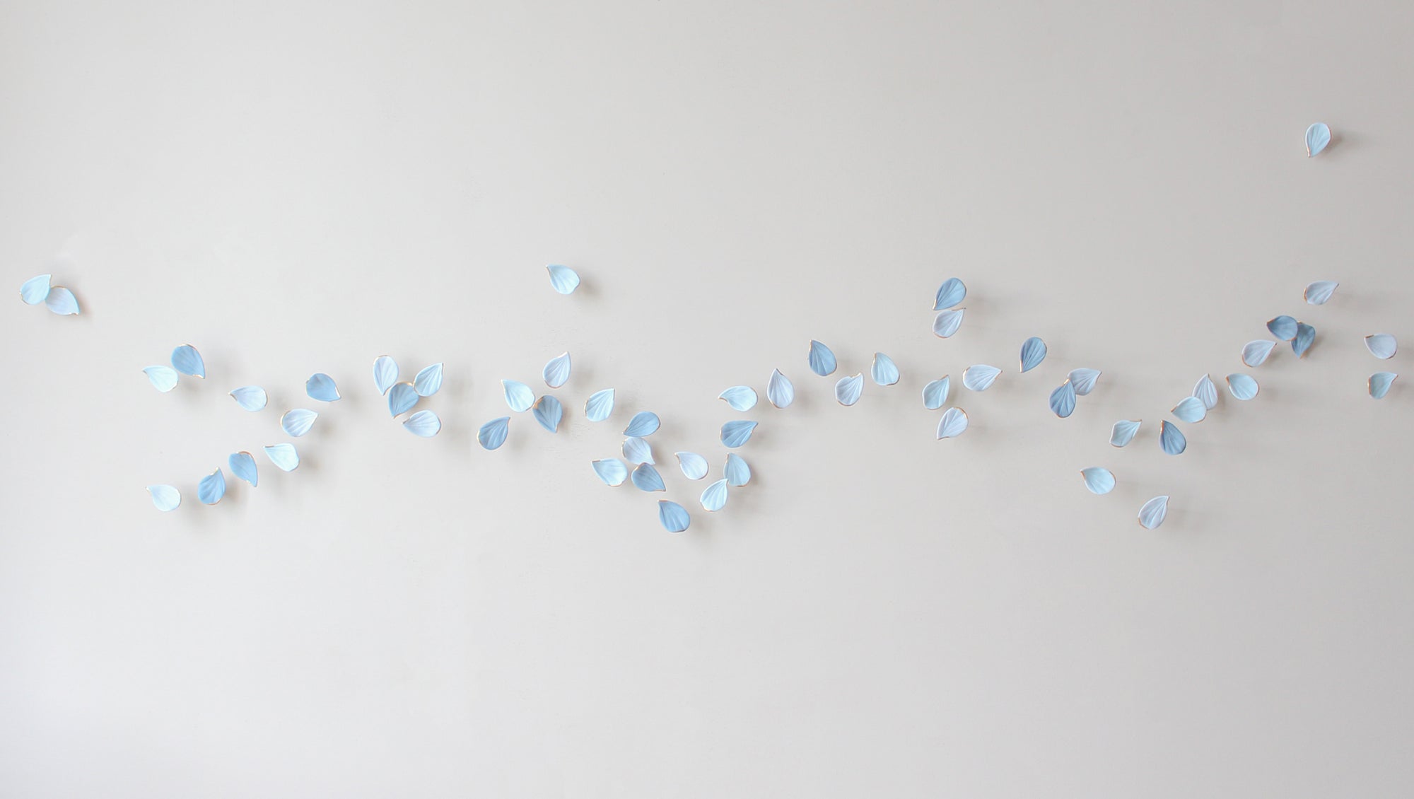 Blue Autumn is a Large porcelain wall art of Blue Leaves handmade in France by Alain Granell