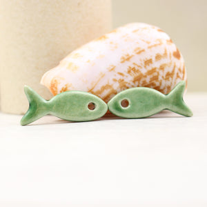 Ceramic fish charms for jewelry and accessories handmade in France by Alain Granell